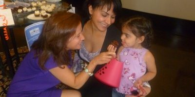 Farnoush and Sophia enjoy some tasty 'cakes in the Burlington Lobby with Flawless Founder, Janine