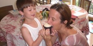 Flawless Founder, Janine Francolini sharing a birthday cupcake with her son Ellis
